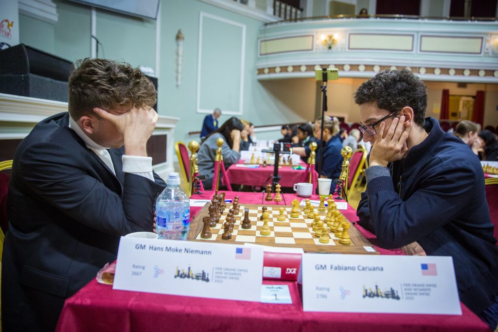 Grand Swiss 10: Caruana and Wang Hao lead